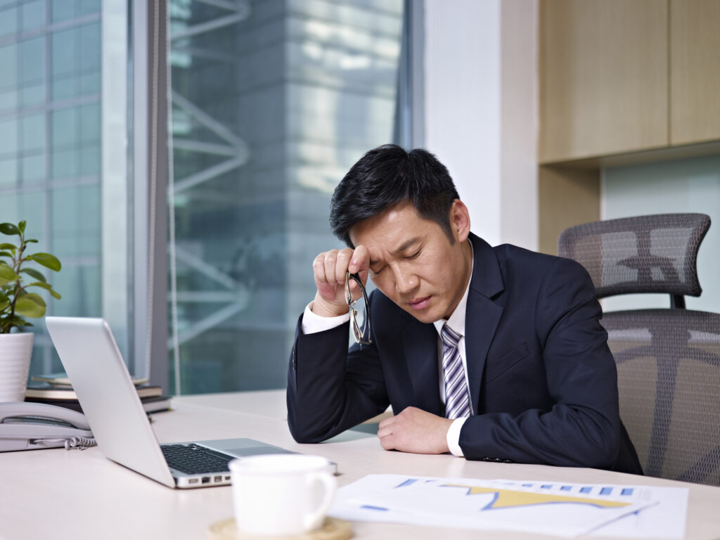 Asian businessman working on project Asian businessman working on project
